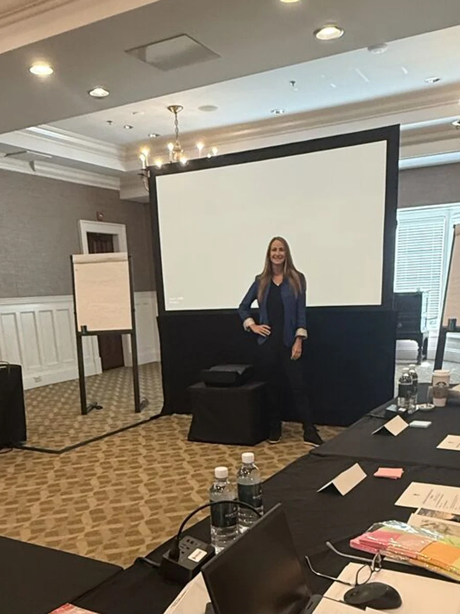 Tracey Abbott at the front of a leadership team session